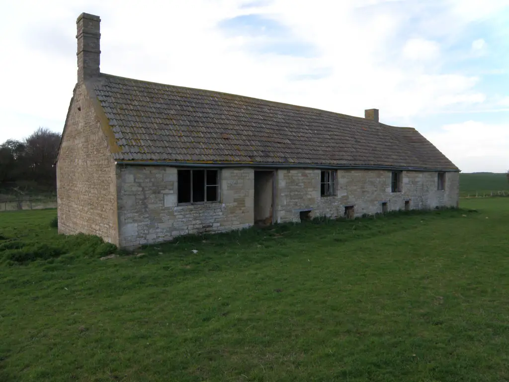 Image showing land with a derelict cottage