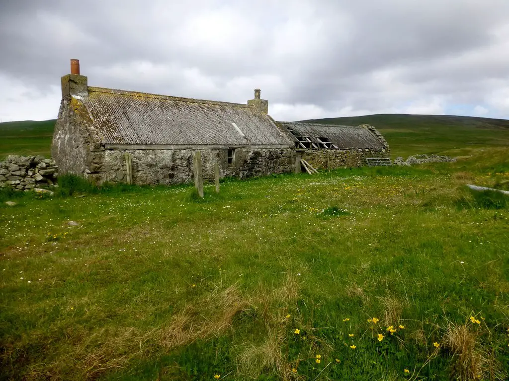 A smallholding in Scotland with a derelict croft house